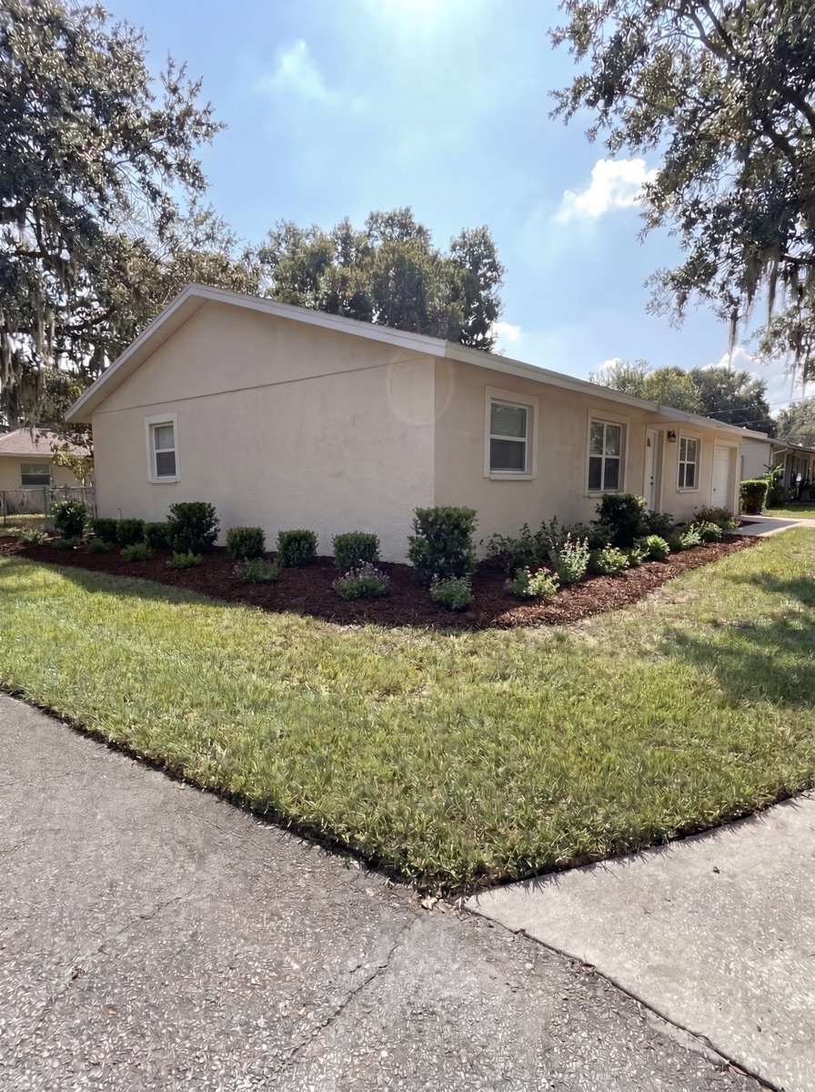 Professional mulch installation around Orlando area home